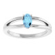 Dainty and feminine, this gemstone ring sets an elegant tone. The ring is set in platinum.