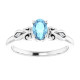 Dainty and feminine, this gemstone ring sets an elegant tone. The ring is set in platinum.