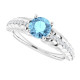 Dainty and feminine, this gemstone ring sets an elegant tone. The ring is set in platinum.