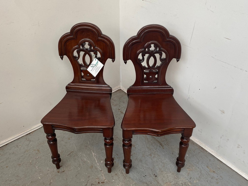 Pair of mahogany hall chairs