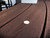 This is an image of a Trex deck board with Trex LED Recessed Deck Lights installed in a close up shot This is an image of a Trex deck board with Trex LED Recessed Deck Lights installed in a close up shot