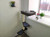 Cat Window Tree — wall-mounted cat shelf with sisal scratching post and steps beside window