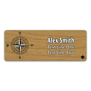 Compass Rose on Scout name tag. Compass image in Black and White ink with Scouting America Fleur-De-Lis on Cherry Wood