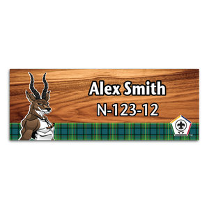Wood Badge Name Tag with Wood Badge Tough Antelope Critter on strip of Tartan design with Wood Badge Logo Wood Badge Name Tag with Wood Badge Tough Antelope Critter on strip of Tartan design with Wood Badge Logo