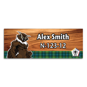 Wood Badge Name Tag with Wood Badge Tough Owl Critter on strip of Tartan design with Wood Badge Logo Wood Badge Name Tag with Wood Badge Tough Owl Critter on strip of Tartan design with Wood Badge Logo