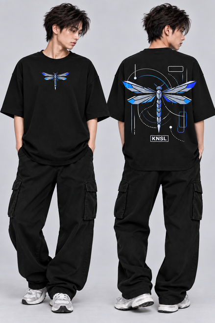Male model showing the front and back of a black KNSL Break Free Tee with a small blue dragonfly emblem and large geometric dragonfly back graphic.