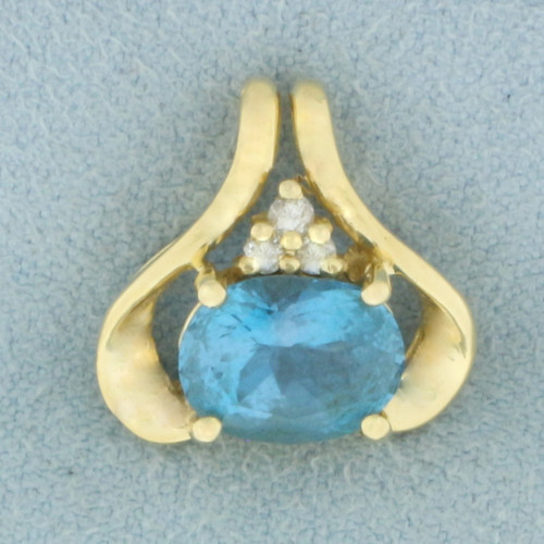 Swiss Blue Topaz and Diamond Pendant in 14k Yellow Gold