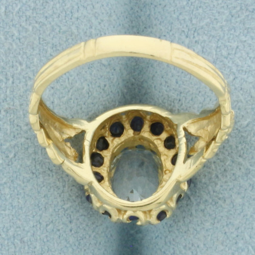 Aquamarine and Sapphire Halo Ring in 14k Yellow Gold