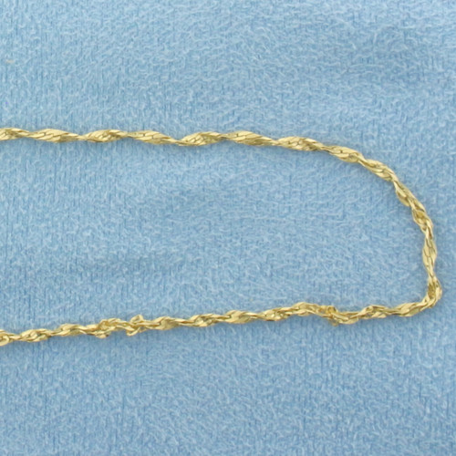 Italian 18 Inch Twisting Herringbone Link Chain Necklace in 14k Yellow Gold