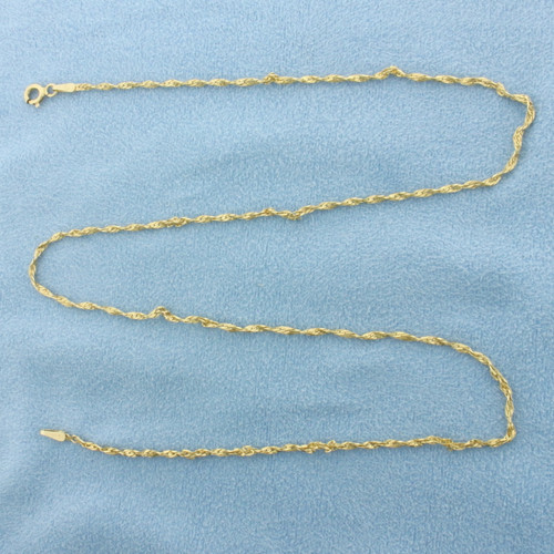 Italian 18 Inch Twisting Herringbone Link Chain Necklace in 14k Yellow Gold