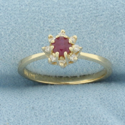 Ruby and Diamond Halo Flower Ring in 14k Yellow Gold