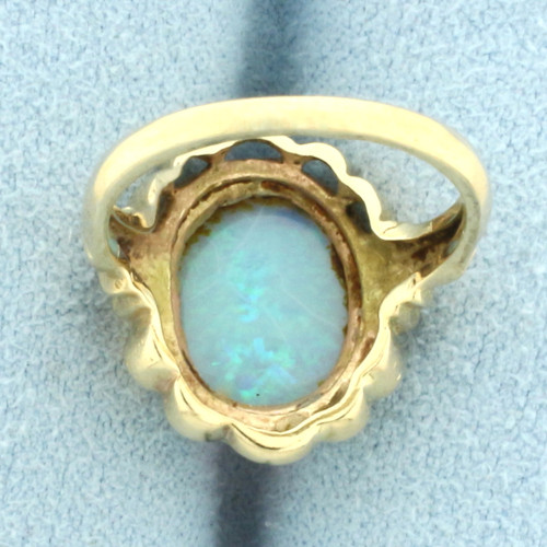 Opal Solitaire Ring in 14k Yellow Gold