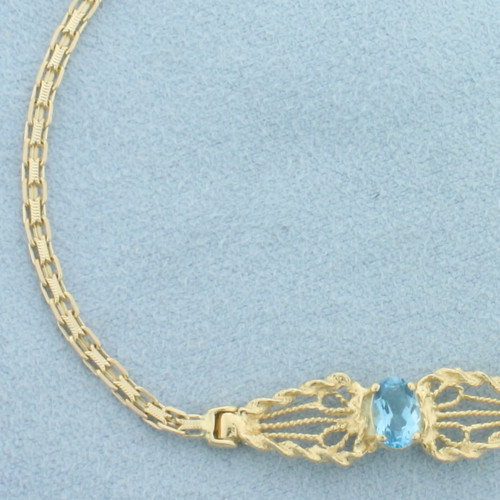 Swiss Blue Topaz Bracelet in 14k Yellow Gold
