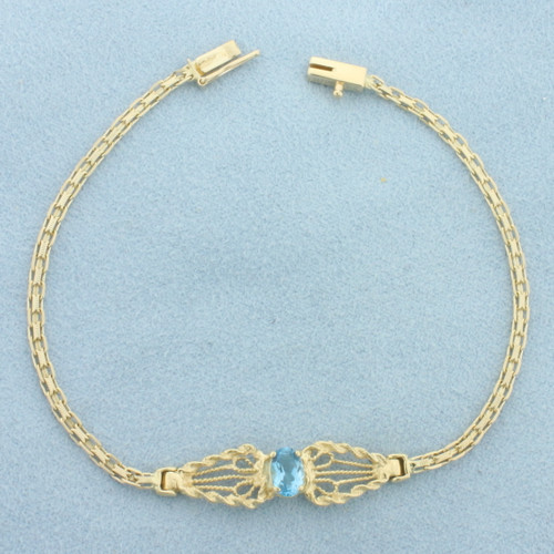 Swiss Blue Topaz Bracelet in 14k Yellow Gold