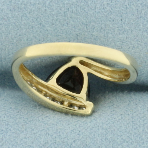 Garnet and Diamond Bypass Ring in 10k Yellow Gold
