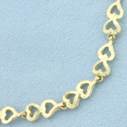 Diamond Cut Heart Link Bracelet in 10k Yellow Gold