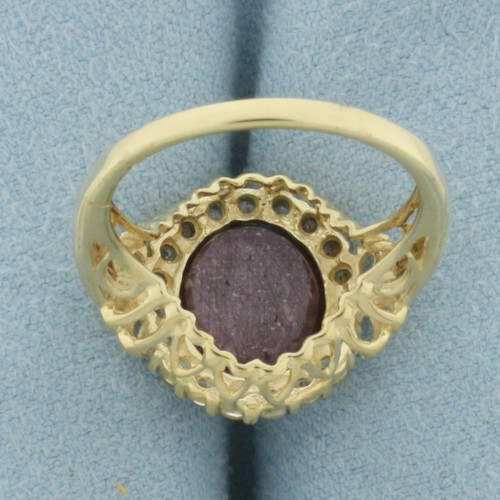 Natural Star Ruby and Diamond Halo Ring in 10k Yellow Gold