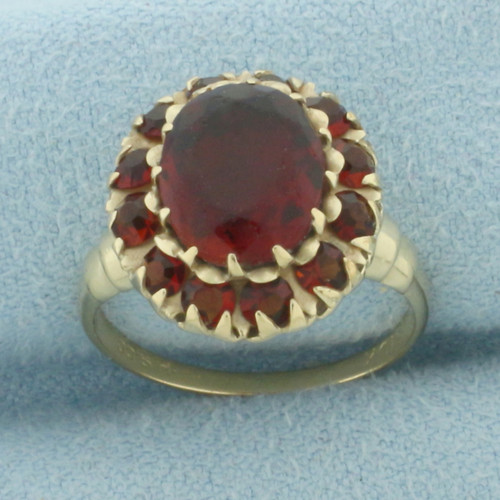 Vintage Garnet Halo Ring in 10k Yellow Gold