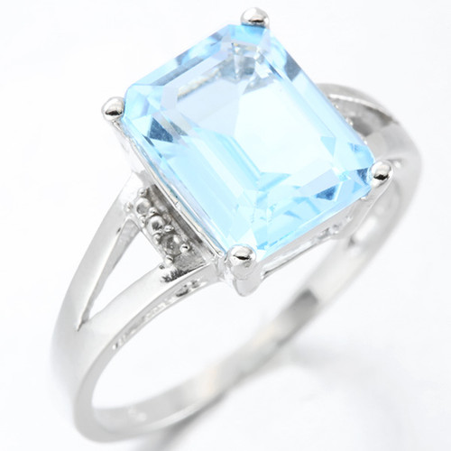Emerald Cut Blue Topaz & Diamond Split Shank Ring in Sterling Silver