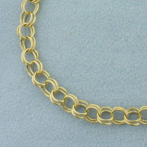 Double Loop Charm Bracelet in 14K Yellow Gold
