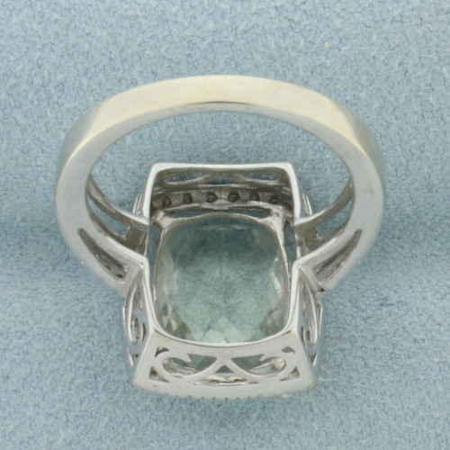 Aquamarine and Diamond Halo Ring in 14k White Gold