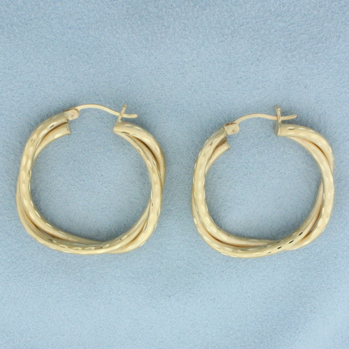 Diamond Cut Satin Finish Twisting Hoop Earrings in 14k Yellow Gold