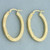 Diamond Cut Oval Hoop Earrings in 14k Yellow Gold