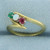Emerald, Opal, and Ruby Ring in 18k Yellow Gold
