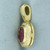 Ruby and Diamond Halo Pendant in 18k Yellow Gold