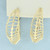 Diamond Cut Cage Hoop Earrings in 10k Yellow Gold