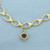Oval Link Charm Bracelet with Garnet Charm in 10k Yellow Gold