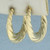 Twisting Design Hoop Earrings in 14k Yellow Gold