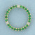 Green Garnet and Diamond Circle Pendant in 10k Yellow Gold