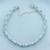 Swiss Blue Topaz and Diamond Tennis Bracelet in 14k White Gold