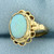 Opal Solitaire Ring in 14k Yellow Gold