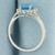Swiss Blue Topaz and Diamond Halo Ring in 14k White Gold