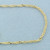 20 Inch Twisting Curb Link Chain Necklace in 14k Yellow Gold