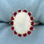 Opal and Ruby Halo Ring in 14k Yellow Gold