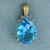 Swiss Blue Topaz and Diamond Pendant in 10k Yellow Gold