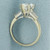 Pear and Baguette White Sapphire Three Stone Ring in 14k White Gold