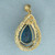 London Blue Topaz and Diamond Pendant in 10K Yellow Gold