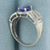Tanzanite and Diamond Halo Ring in 14K White Gold