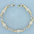 Golf Ball Link Bracelet in 14K Yellow Gold and Sterling Silver
