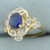 Sapphire and Diamond Scroll Design Ring in 14k Yellow Gold