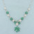 6ct Emerald and Diamond Flower Design Necklace in 14k White Gold