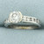 Unique Half Bezel Diamond Engagement Ring in Platinum