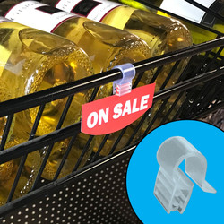 Wire shelving sign holder, shown attached to wine wire basket.