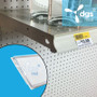 Economy Snap-In Angled Info Strip Label Holder White, 48"W shown on a gondola shelf at a store