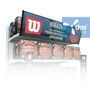 Retail gondola shelving header topper sign holder shown on convenience store shelving with sporting goods