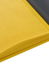 Debossed logo inside cover of Palms Off Gaming Stealth yellow 9 pocket binder designed for stealthy-look card storage.